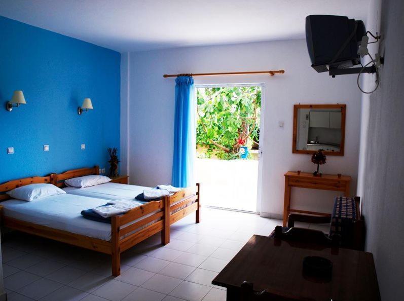 Amarilia Aparthotel Skala Rachoni  Quarto foto